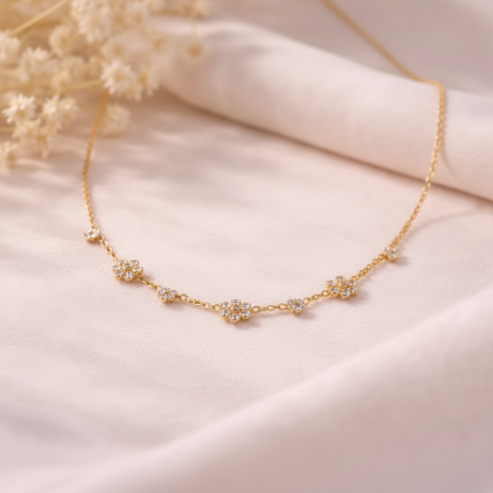 Goldene Edelstahl-Blumenkette